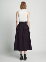 Back full length image of model wearing Poplin Belted Skirt in BLACK