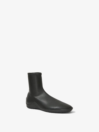 Front 3/4 image of Grip Stretch Ankle Boots in BLACK