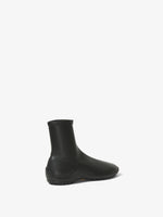 Back 3/4 image of Grip Stretch Ankle Boots in BLACK