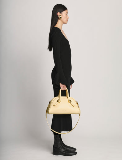 Image of model wearing Bowler Bag in BIRCH