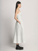 Side full length image of model wearing Poplin Bustier Dress in WHITE