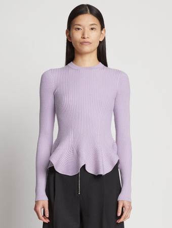 Front cropped image of model wearing Fluted Rib Knit Peplum Sweater in LAVENDER