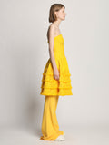 Side full length image of model wearing Textured Fringe Knit Sculpted Dress in LEMON