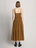 Back full length image of model wearing Poplin Bustier Dress in TOBACCO