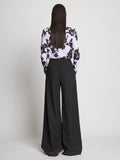Back full length image of model wearing Printed Floral T-Shirt in PURPLE MULTI