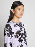 Detail image of model wearing Printed Floral T-Shirt in PURPLE MULTI