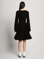 Back full length image of model wearing Viscose Crepe Jersey Dress in BLACK