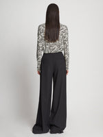 Back full length image of model wearing Printed Floral T-Shirt in BLACK MULTI