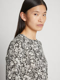 Detail image of model wearing Printed Floral T-Shirt in BLACK MULTI