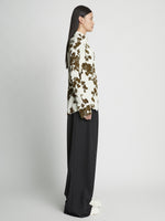 Side full length image of model wearing Floral Garment Printed Shirt in ECRU MULTI