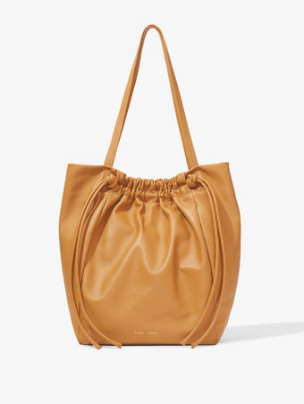 Front image of Drawstring Tote in CARAMEL