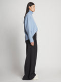 Side image of model wearing Doubleface Cashmere Oversized Turtleneck in light blue