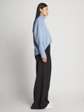 Side image of model wearing Doubleface Cashmere Oversized Turtleneck in light blue