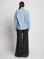 Back image of model wearing Doubleface Cashmere Oversized Turtleneck in light blue
