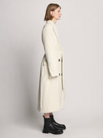 Side image of model wearing Brushed Alpaca Coat in ecru