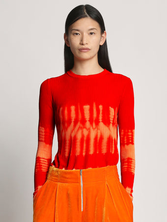 Cropped front image of model wearing Viscose Knit Tie Dye Top in orange multi
