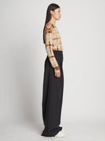 Side image of model wearing Tie Dye T-Shirt in brown multi