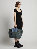 Image of model wearing XL Morris Raffia Tote in DOVE GREY