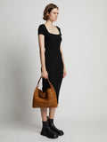 Image of model wearing Minetta Raffia Bag in HONEY
