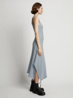 Side image of model wearing Stripe Rib Sleeveless Dress in sky blue/black