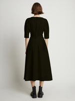 Back image of model wearing Poplin V-Neck Puff Sleeve Dress in black