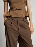 Detail image of model wearing Drapey Suiting Wide Leg Pant in coffee