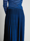 Detail image of model wearing Sheer Stripe Knit Skirt in cerulean/black