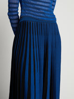 Detail image of model wearing Sheer Stripe Knit Skirt in cerulean/black
