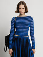 Cropped front image of model wearing Sheer Stripe Sweater in cerulean/black