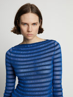 Detail image of model wearing Sheer Stripe Sweater in cerulean/black