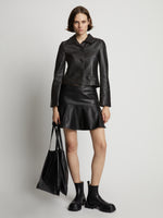 Front image of model wearing Cropped Leather Blazer in black