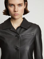 Detail image of model wearing Cropped Leather Blazer in black