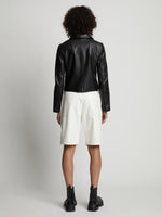Back image of model wearing Faux Leather Shorts in off white