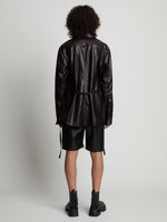 Back image of model wearing Faux Leather Shirt Jacket in black