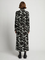 Back image of model wearing Printed Long Sleeve Shirt Dress in mint/black