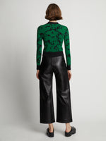 Back image of model wearing Knit Floral Cardigan in green/black