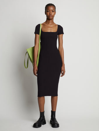 Front image of model wearing Rib Knit Short Sleeve Dress in black