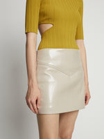 Detail image of model wearing Vinyl Mini Skirt in fawn