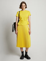 Front image of model wearing Side Slit T-Shirt in sun