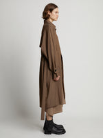 Side image of model wearing Drapey Suiting Trench Coat in coffee