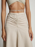 Detail image of model wearing Gingham Tie Front Midi Skirt in buttercream/fawn