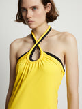 Detail image of model wearing Halter Knit Jersey Dress in sun