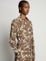 Detail image of model wearing Printed Long Sleeve Shirt Dress in buttercream/coffee