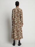 Back image of model wearing Printed Long Sleeve Shirt Dress in buttercream/coffee