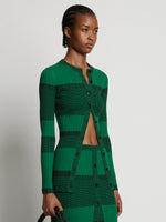 Cropped front image of model wearing Mini Stripe Cardigan in green/black