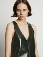 Detail image of model wearing Vinyl V-Neck Shift Dress in pine