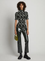 Front image of model wearing Vinyl Cropped Pant in pine