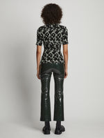 Back image of model wearing Vinyl Cropped Pant in pine