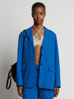 Cropped front image of model wearing Cotton Linen Blazer in cerulean