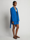Side image of model wearing Cotton Linen Blazer in cerulean